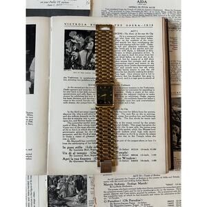waltham gold tone tank black dial watch
